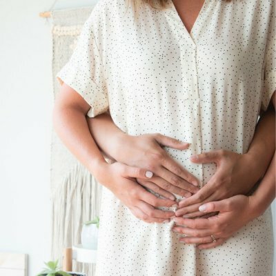 hands on woman's stomach